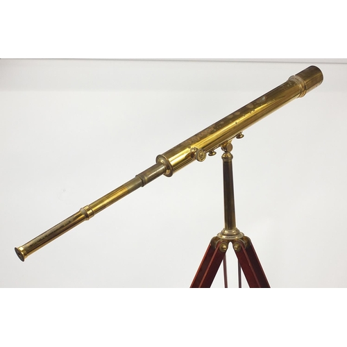 2070 - Floor standing brass telescope with brass and wooden tripod base, by Culpeper instruments Ltd Englan... 