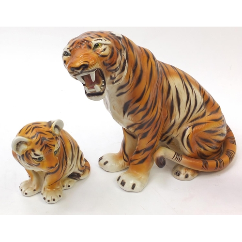 2066 - Hand painted ceramic tiger with two cubs, the largest, 70cm in length