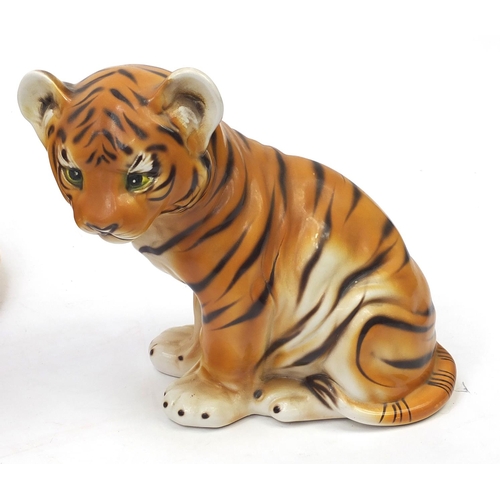 2066 - Hand painted ceramic tiger with two cubs, the largest, 70cm in length