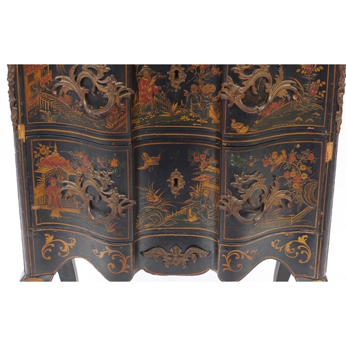 2010 - Chinoiserié black lacquered serpentine fronted two drawer chest, decorated with figures on horse bac... 