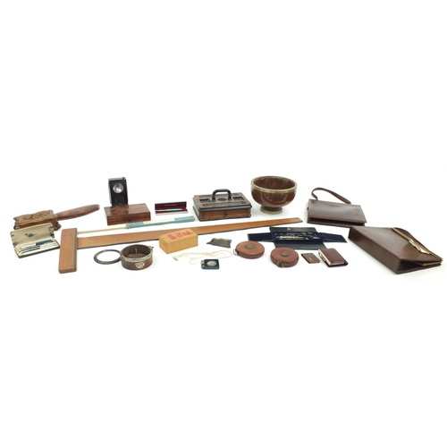 203 - Box of items including wooden desk stand, simulated pearl necklaces, vintage leather tape measures, ... 