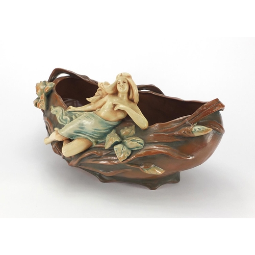 163 - Austrian Art Nouveau pottery centre piece, mounted with a semi nude female, impressed marks to the b... 