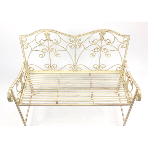 36 - Wrought iron garden bench with scroll arms, 92cm H x 105cm W x 53cm D