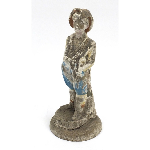 110 - Stoneware garden figure of a boy wearing a hat, 62cm high