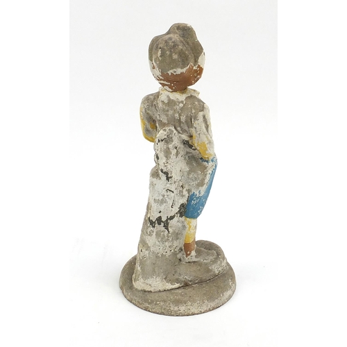 110 - Stoneware garden figure of a boy wearing a hat, 62cm high