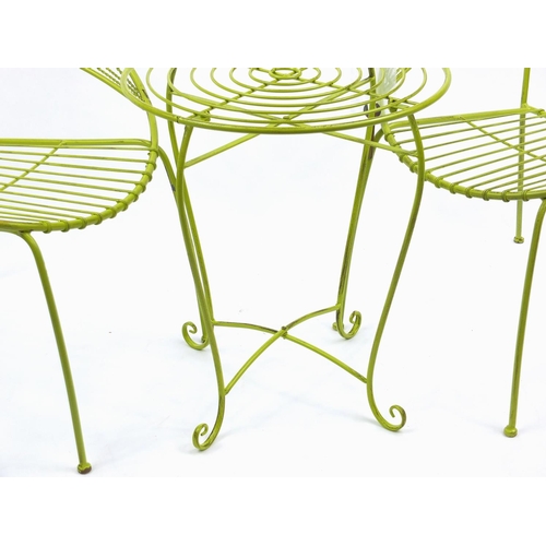 25 - Green Painted wrought iron table and two chairs