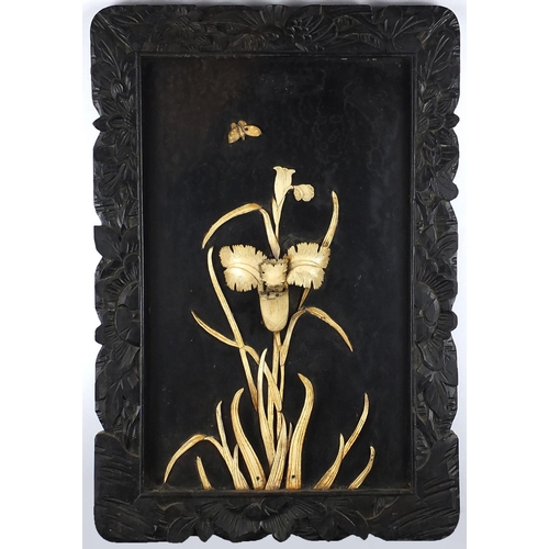 215 - Oriental ebonised wood and carved bone floral panel, 55cm x 37cm