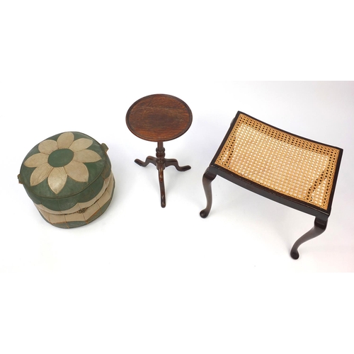 28 - Occasional furniture comprising oak tripod wine table, mahogany Bergere stool and a leather cushion