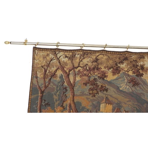 57A - Tapestry wall hanging of a continental lake scene, with brass fitting, 160cm x 70cm