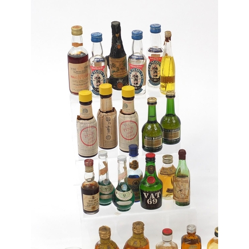 194 - Collection of alcohol miniatures including Dimple Whisky, Harp Lager, Bells Whisky etc