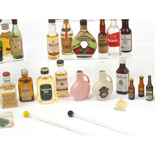 194 - Collection of alcohol miniatures including Dimple Whisky, Harp Lager, Bells Whisky etc