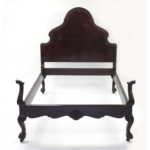 57 - Victorian mahogany bedframe, raised on cabriole legs and ball and claw feet, the headboard 173cm H x... 