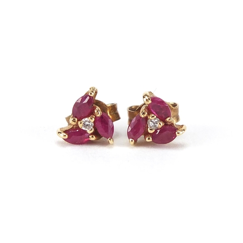 240 - Pair of 9ct gold ruby and clear stone earrings, approximate weight 0.8g