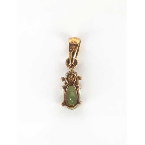 233 - 9ct gold green stone and diamond pendant, 1.2cm in length, approximate weight 0.4g