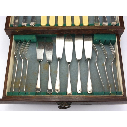 184A - Oak canteen of mostly silver plated cutlery