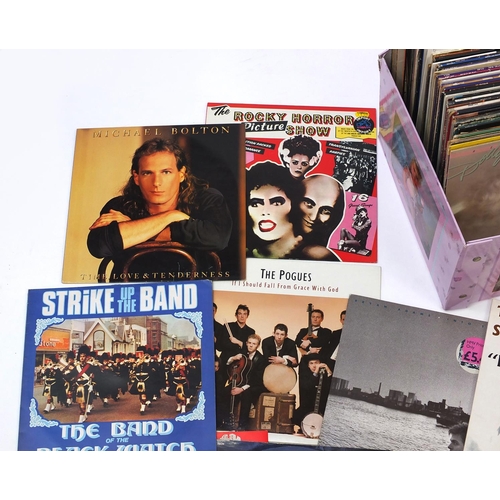 221 - Two boxes of vinyl LP records some singles including The Smith's, Iron Maiden, Big Country, Eric Cla... 