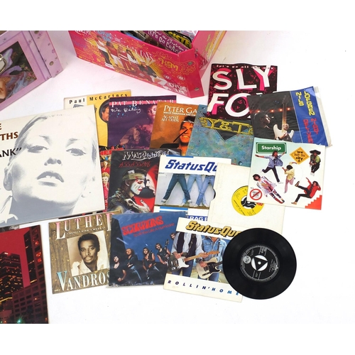 221 - Two boxes of vinyl LP records some singles including The Smith's, Iron Maiden, Big Country, Eric Cla... 