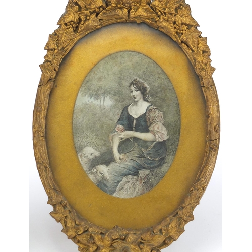 146 - Pair of coloured oval portrait prints housed in gilt grape vine frames, overall 27cm in length