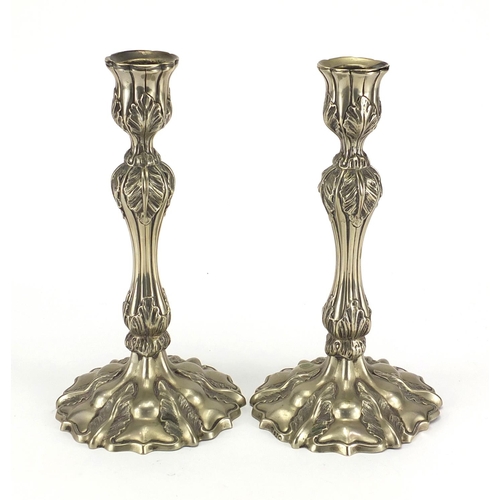 138 - Pair of silver plated candlesticks, 25cm high