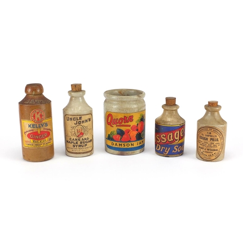 159 - Five stoneware advertising bottles with paper labels, including Damson Jam, Uncle John's Cane and Ma... 