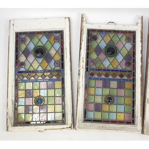 2072 - Four rectangular leaded stained glass panels, each 98cm x 53cm