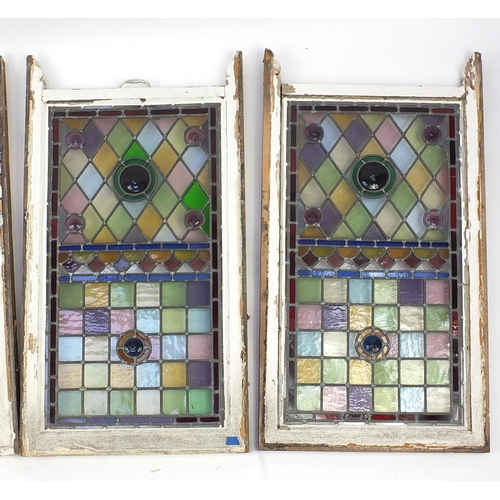 2072 - Four rectangular leaded stained glass panels, each 98cm x 53cm