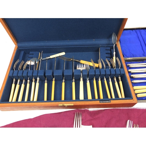 200 - Silver plated and stainless steel cutlery, some with ivorine handles and two silver spoons