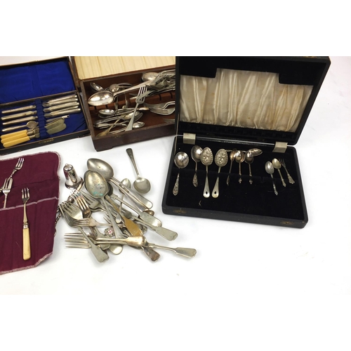 200 - Silver plated and stainless steel cutlery, some with ivorine handles and two silver spoons