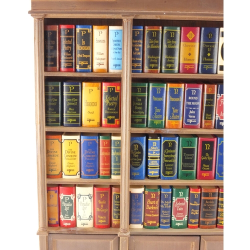 2123 - Collection of Del Prado miniature books housed in a bookcase of small proportions, the books includi... 