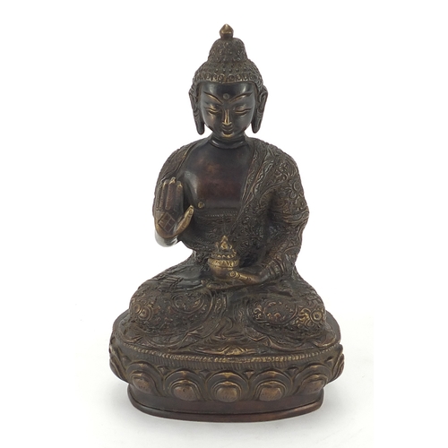 2124 - Chino Tibetan Buddha seated in the lotus position, 22cm high