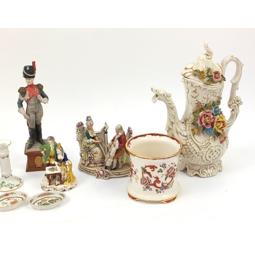 199 - Decorative figures including soldiers, large Capodimonte jug etc, the largest 47cm high