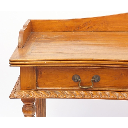 2043 - Hardwood serpentine fronted serving table with three drawers, 76cm high x 120cm wide x 43cm deep