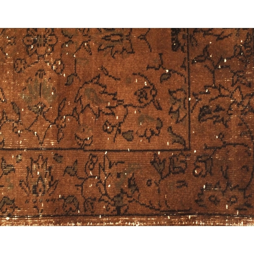 2077 - Vintage Anatolian carpet having all over floral design onto a brown ground 315cm x 190cm