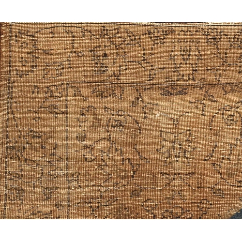 2077 - Vintage Anatolian carpet having all over floral design onto a brown ground 315cm x 190cm