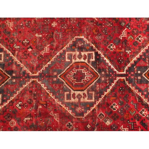 2071 - Rectangular Persian Hamadan rug, the central field having animals and floral motifs, within geometri... 