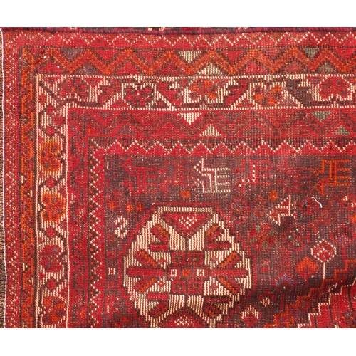 2071 - Rectangular Persian Hamadan rug, the central field having animals and floral motifs, within geometri... 