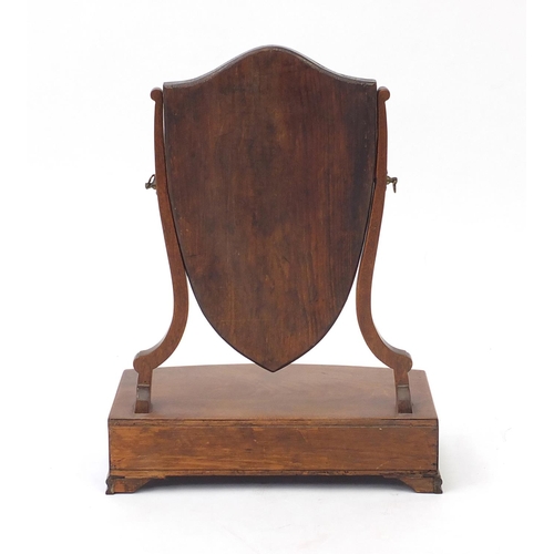 2011 - Edwardian walnut shield shape toilet mirror with three drawers to the base, 59cm high