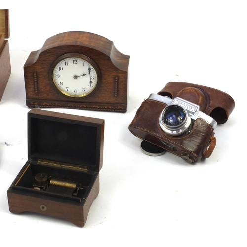 204 - Box of items including a mahogany barometer, coins, oak cased mantle clock and a Wrayflex camera