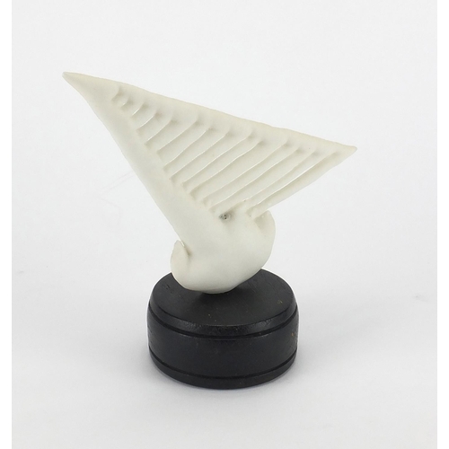 2133 - Porcelain Modernist sculpture on wooden base, 17cm high