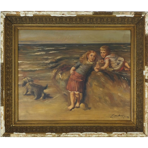 2141 - Children with their dog by the beach, oil onto board,  bearing an indistinct signature, gilt framed,... 