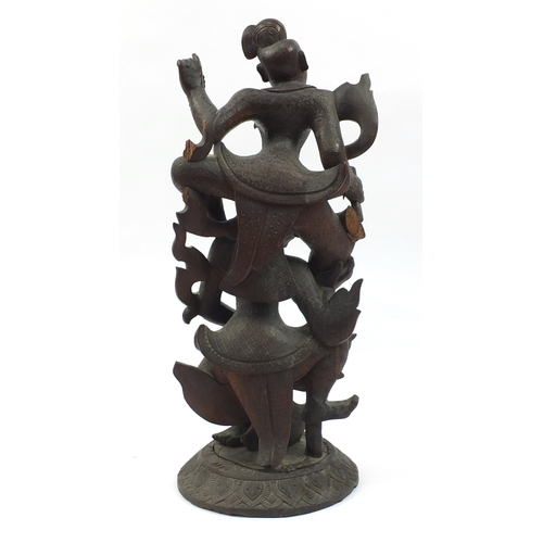 2097 - Large Middle Eastern carved wooden figure group of two figures, on a circular base, 77cm high