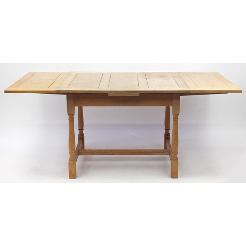2012a - Heals Art Deco limed oak draw leaf dining table with four chairs and a sideboard, fitted with three ... 