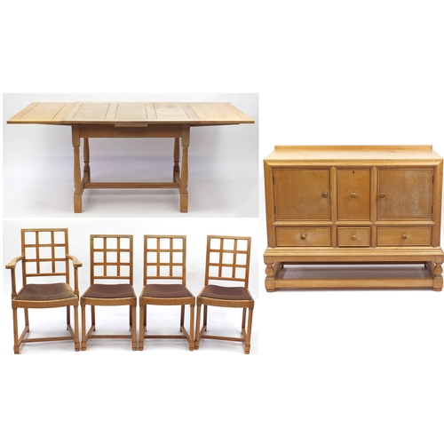 2012a - Heals Art Deco limed oak draw leaf dining table with four chairs and a sideboard, fitted with three ... 