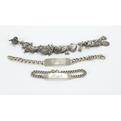 234 - Silver charm bracelet with a selection of mostly silver charms and two silver identity bracelets, ap... 