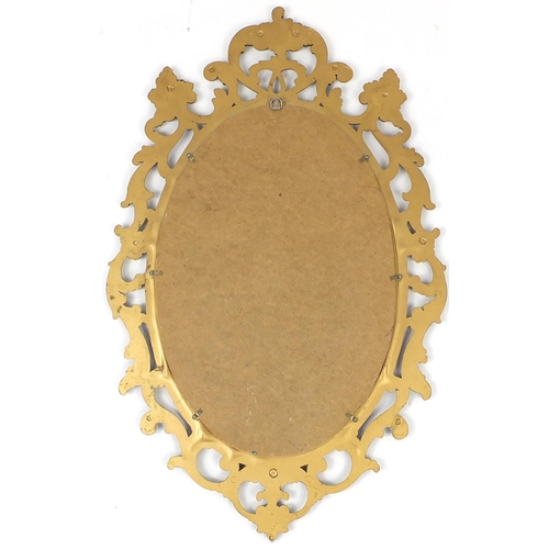 5 - Ornate gilt framed oval wall hanging mirror, 90cm x 56cm