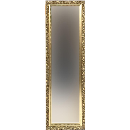 62 - Three gilt framed mirrors, the larger with bevelled plate, 133cm x 41cm