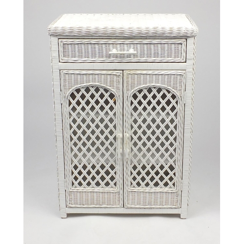 81 - Cane and wicker two door bathroom cabinet, fitted with a frieze drawer, 87cm H x 58cm W x 37cm D