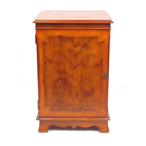 96 - Inlaid yew cupboard enclosing four drawers, 84cm H x 53cm W x48cm D