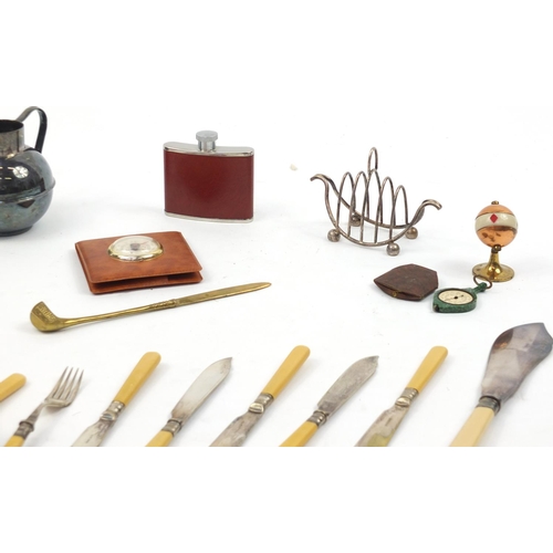 184 - Box of objects including a Bakelite map measurer, fish knives and forks, gilt barometer, silver plat... 