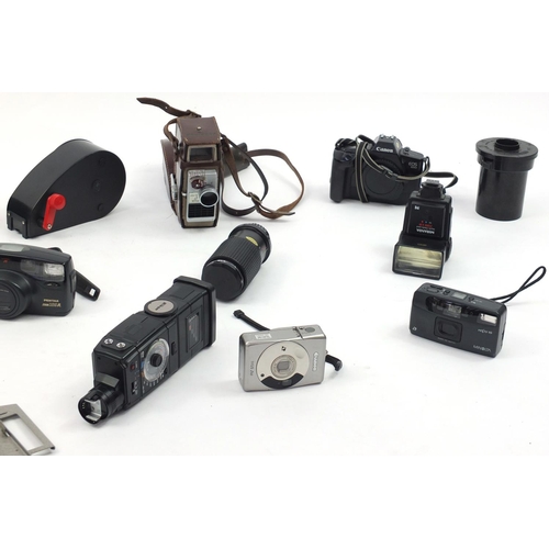 198 - Vintage and later cameras, lenses and accessories including Nikon, Canon and Praktica examples